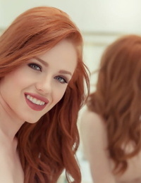 Hawt redhead Ella Hughes licks her fingers after they were inside her vagina