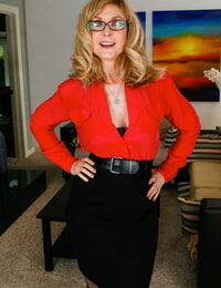 Grown-up lady Nina Hartley wears glasses while flaunting the brush big tits far nylons