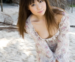 Sexy Japanese girl Aya Hirai gets naked on a tropical beach during solo action