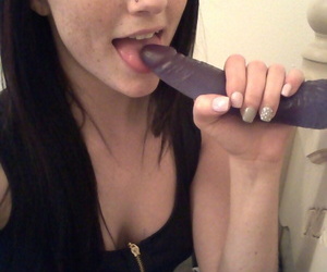 Self shot of hot teen amateur Freckles toying big tits with dildo