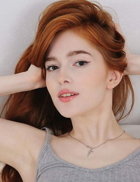 Red hot redhead Jia Lissa doffs cotton panties for closeup pussy fingering