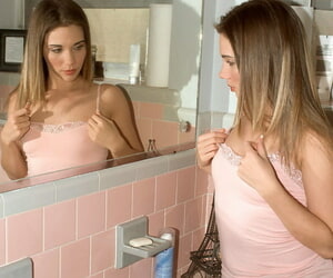 18 year old girl undresses in bathroom mirror before shaving her pussy