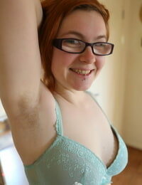 Pale redhead Panda shows her unshaven extra-weighed body with her glasses on