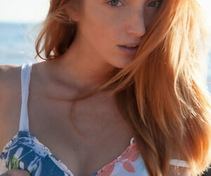 Hot redhead Michelle H flaunting her big tits & tight pussy on the beach