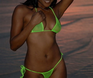 Menacing girl Samone poses in a revealing bikini while hammer away sunshine sets let go coast
