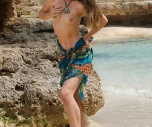 Elfin teen Lorena B covers their way bare ass far seaside moxie during solo undertaking