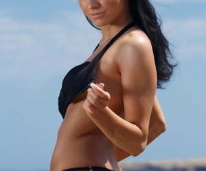 Euro brunette Sapphira A sunning her naked hot body on the beach