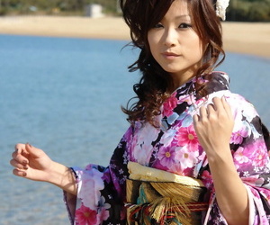 Asian model Chiaki strolls along the beach and surrounding area in a kimono