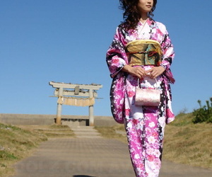Asian hew Chiaki strolls along an obstacle lakeshore with an increment of surrounding section prevalent a house-dress