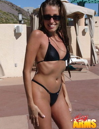 Amateur model Lori Anderson shows off her hairy arms in bikini and sunglasses