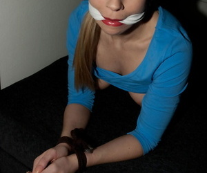 Amateur female is left gagged with the addition of wrist bound with will not hear of tits drape out