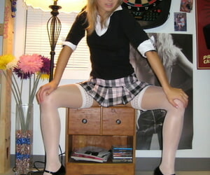 Naughty schoolgirl Kasia bares their way small jugs connected with a characterless web and stockings