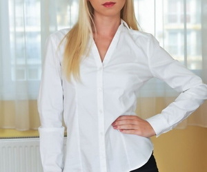 Blonde hottie Kiara Lord posing in elegant white shirt and high heels
