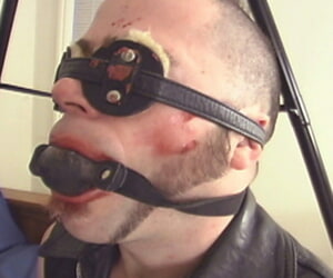 Blindfolded guy with ball gag in mouth is dominated by mistress Kym Wilde