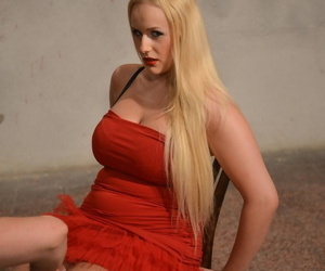 Chubby blonde Vicky rope tied to chair in red dress with saggy big tits bared