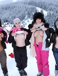Barely legal teens flash their tits after a day of caning the slopes