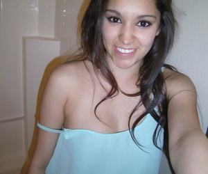 Petite amateur brunette cutie Selena takes a selfie of her hot tits and ass