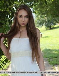 Beautiful teen Valery Leche steps out of her dress to model totally naked