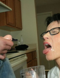 Slutty grown up brunette in glasses gives a blowjob and gets bukkaked