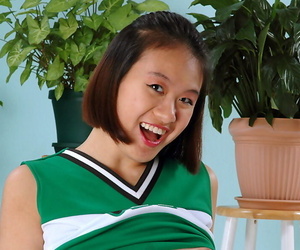 Bungling Asian freeing chunky chest and ass wean away from beneath cheerleader unvaried