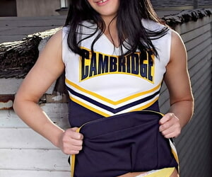 Teen cheerleader Jenna Ross doffs her uniform to pose nude on a rooftop patio