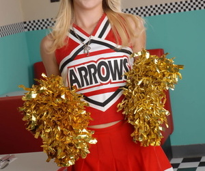 Cute blonde Tegan Summers models non nude in her cheerleader uniform