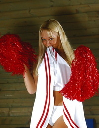 Seductive blond cheerleader erotic dancing and teasing her soaked pussy
