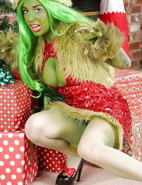 Green-skinned infant Joanna Dear standing astonishingly perspired on Christmas