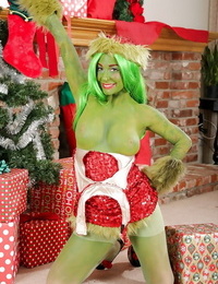 Green-skinned infant Joanna Dear standing astonishingly perspired on Christmas