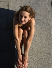 Gossamer teen strikes first-class nude poses on a harbour line engraving in a chunky city