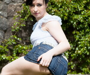 Dark haired amateur Jena flashes panty upskirt spreading trotters into public notice