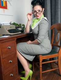 MILF secretary Sophie Delane in glasses striptease to spread naked at her desk