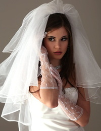 Glamour model Little Caprice strips off her wedding dress
