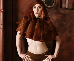 Sexy redhead Anastassia Bear strikes great solo poses in flesh toned hosiery