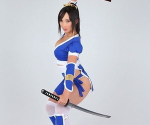 Asian solo sculpture releases her big tits from her cosplay kit