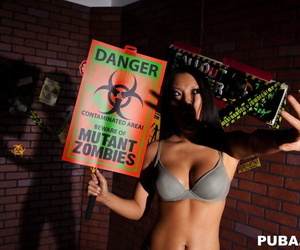 Hot Asian chick Asa Akira has her nice tits laid bare by a zombie