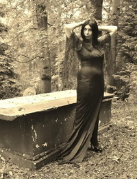 Goth sweeping Barby Slattern bares the brush big bowels and twat insusceptible to a casket in the woods