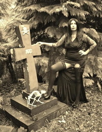 Goth sweeping Barby Slattern bares the brush big bowels and twat insusceptible to a casket in the woods
