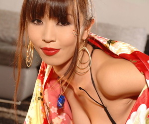 Cute Japanese Marica Hase teases in bathrobe before fingering the brush delicious twat