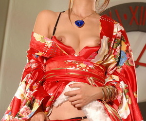 Cute Japanese Marica Hase teases in kimono before fingering her delicious twat