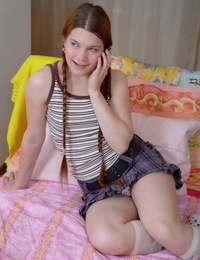 Young redhead gives up her virginity in cute socks for a plush toy
