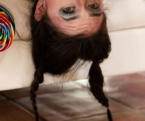 Young looking girl Lucie Cline gets endures facial abuse in braided pigtails