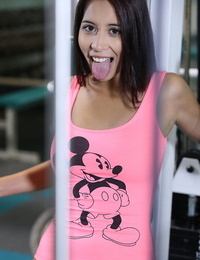 Cute teen brunette Paula Shy shows her little pink pussy at naked gym workout