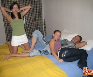 Young girls caress forwards treating their man join up respecting a threesome