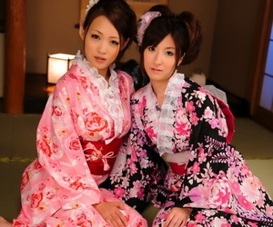 A heart of hearts of Japanese Geishas model draw up regarding their brightly colored kimonos