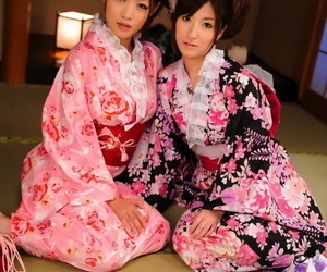 A heart of hearts of Japanese Geishas model draw up regarding their brightly colored kimonos
