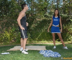 Added X-rated cheerleader with shaved slit Halia Wen gets nailed outdoor