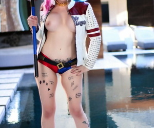 Solo girl Leyla Falcon models next to a pool in a cosplay outfit