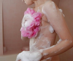 Asian teen Kaori Nagahashi taking shower and caressing her tiny curves