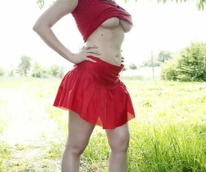 Chubby teen in a red comprehensive Ricky exposing say no to big tits outdoor